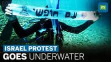 Watch: Israeli commandos stage underwater protest protest against judiciary overhaul